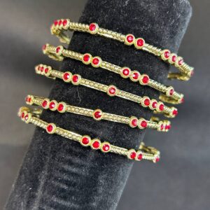 GOLD BRACELET WITH RUBY STONES