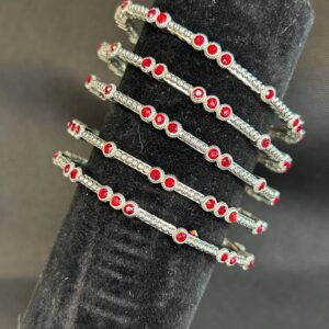 SILVER BRACELET WITH RED STONES